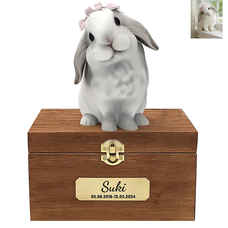 The Bunny Sweet Memories features a white and gray rabbit with a pink bow on a wooden box engraved "Suki 03.08.2018–12.03.2024," plus a small photo of the real bunny in the top right corner.